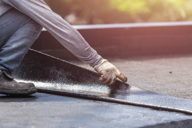 Professional Waterproofing technician working in Scottsville, NY